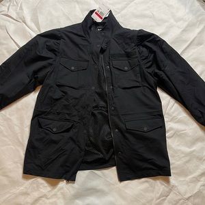 Nike women’s zip and button adjustable loose fit tech pack jacket